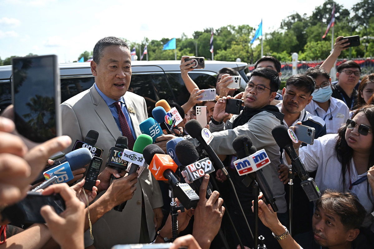 <i>Lillian Suwanrumpha/AFP/Getty Images via CNN Newsource</i><br/>Thai Prime Minister Srettha Thavisin speaks to the media as he arrives at Government House