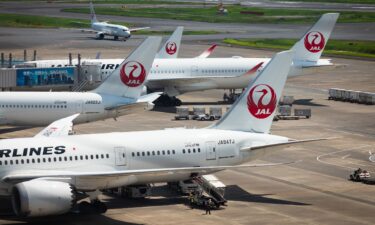 Japan Airlines planes at Haneda Airport in Tokyo on August 10.