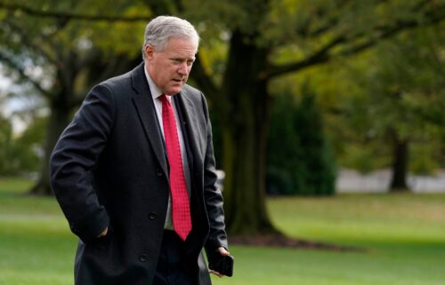 White House chief of staff Mark Meadows walks on the South Lawn of the White House in Washington