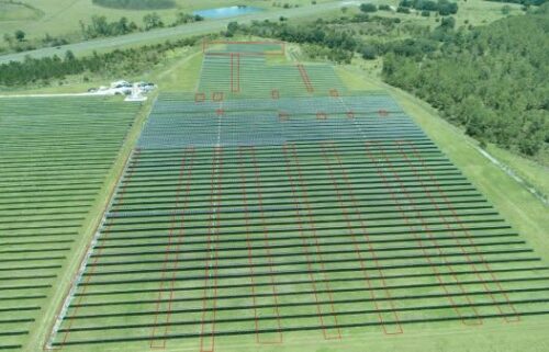 Aerial photo of the solar panel field Hnaihen allegedly attacked with targeted panel areas outlined in red.