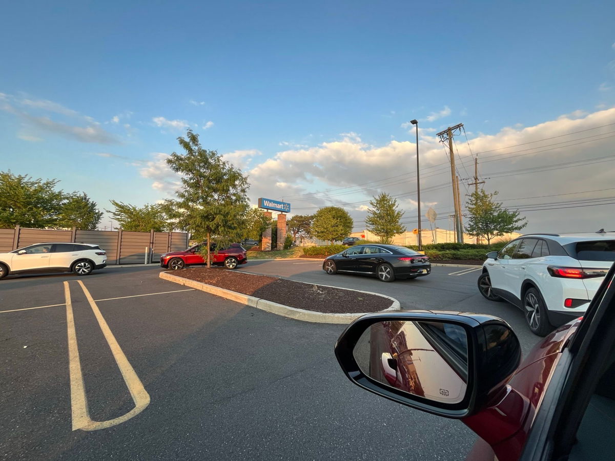 <i>Peter Valdes-Dapena/CNN via CNN Newsource</i><br/>A line of EVs wait to charge at Electrify America chargers in East Brunswick