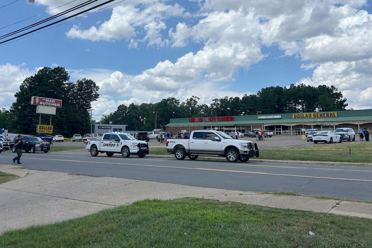 <i>Ainsley Platt/Arkansas Democrat-Gazette/AP via CNN Newsource</i><br/>Police vehicles remain on the scene of a shooting at the Mad Butcher grocery store on June 21