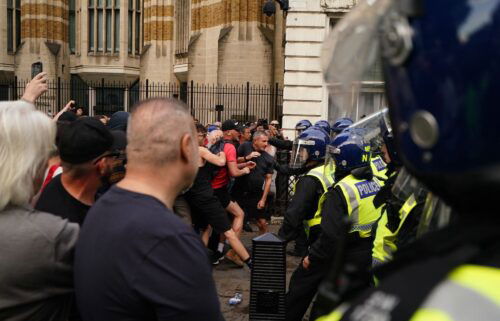 Far-right protesters scuffle with police at the "Enough is Enough" demonstration in London on July 31.