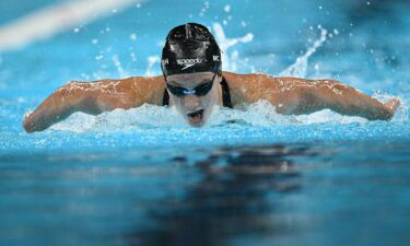 McIntosh races to 200m butterfly gold in Paris.