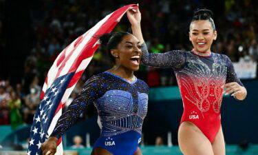 US gymnasts Simone Biles and Sunisa Lee celebrate their gold and bronze medals