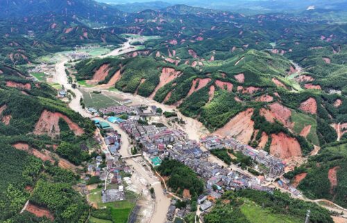 A photo released by Xinhua News Agency shows areas damaged by flooding in China's Hunan province on July 30