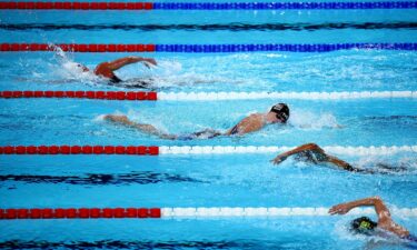 By winning a silver medal in the women’s 4x200m freestyle relay