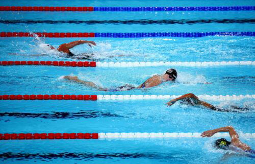 By winning a silver medal in the women’s 4x200m freestyle relay