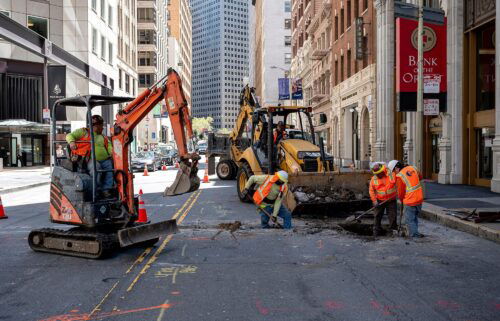 Construction workers are pictured in San Francisco on May 7. The pandemic threw the US job market into chaos