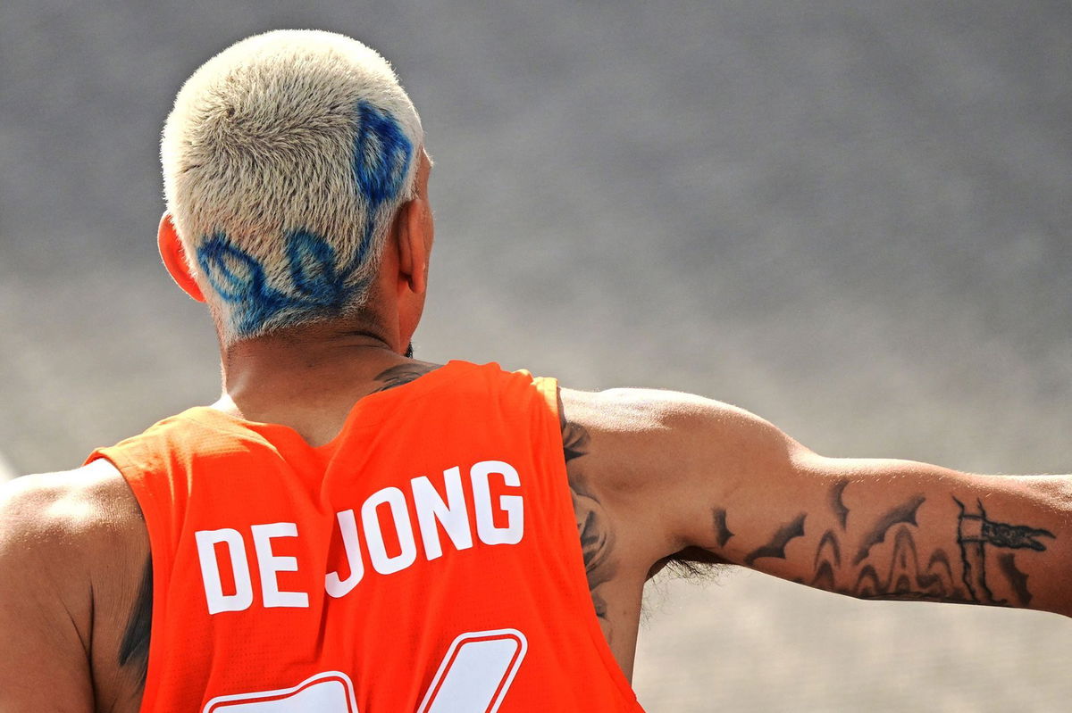 <i>Angelika Warmuth/Reuters via CNN Newsource</i><br/>Olympic basketball player Worthy de Jong of Team Netherlands decided to switch up his look with a blue dyed flower painted across his bleached buzz cut.