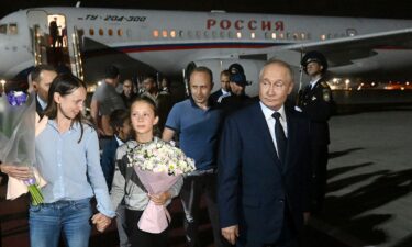 Russian President Vladimir Putin met the released agents and their children at Moscow's Vnukovo Airport on August 1.