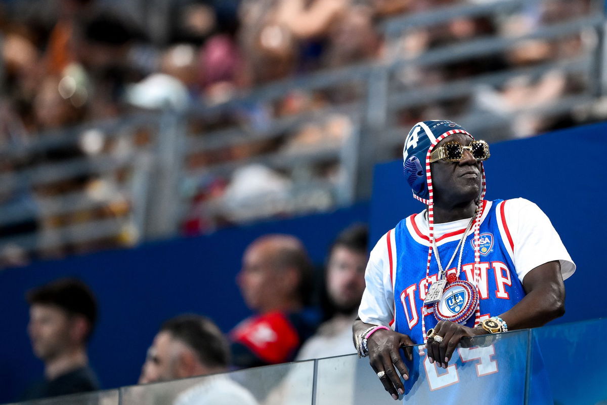 <i>Deepbluemedia/Mondadori Portfolio/Getty Images via CNN Newsource</i><br/>Flavor Flav watches the women's water polo match between team Italy team USA at the Paris Olympics on July 31.