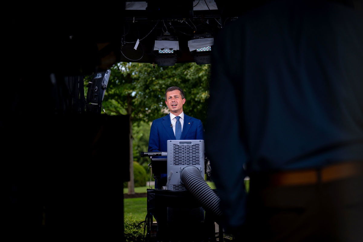 <i>Andrew Harnik/Getty Images via CNN Newsource</i><br/>Transportation Secretary Pete Buttigieg speaks during an interview on the North Lawn of the White House in Washington