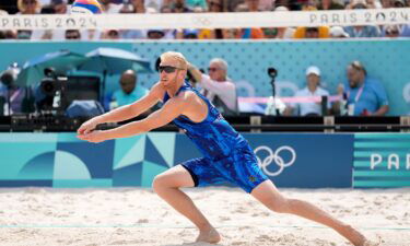 Chase Budinger plays in a beach volleyball match against Spain at the Paris Olympics.