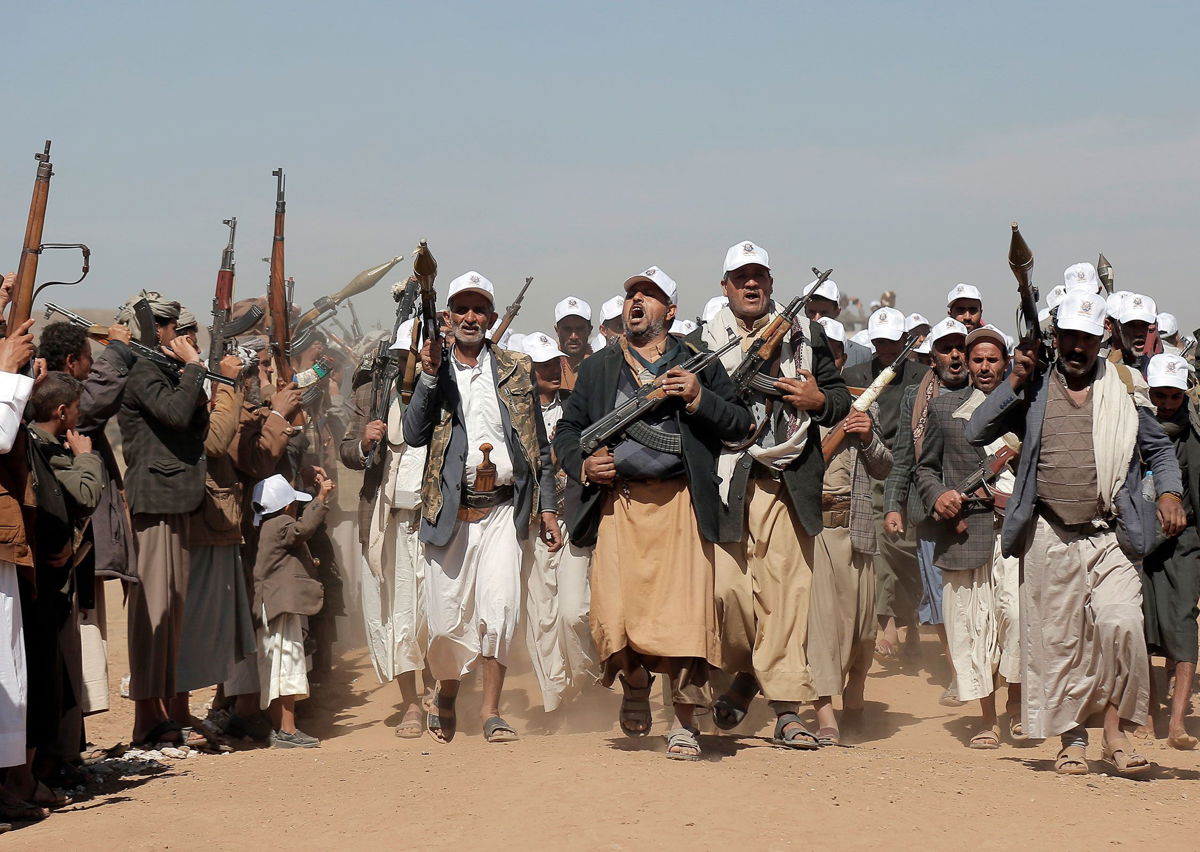 <i>AP via CNN Newsource</i><br/>Houthi fighters march during a rally outside Sanaa