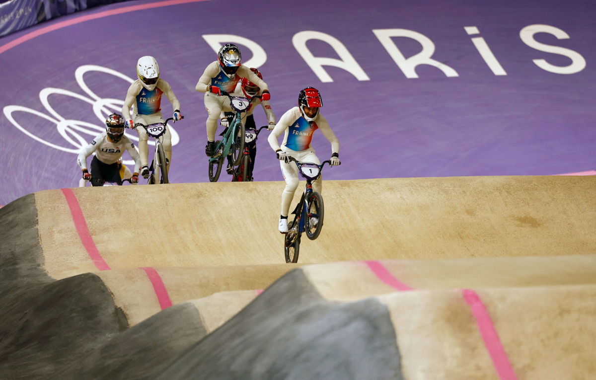 <i>Gonzalo Fuentes/Reuters via CNN Newsource</i><br/>The French trio lead the men's BMX race.