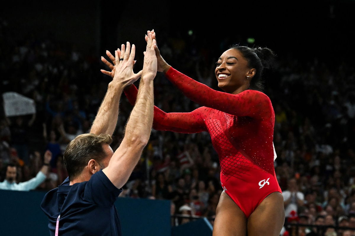<i>Paul Ellis/AFP/Getty Images via CNN Newsource</i><br/>Simone Biles spent years working on her mental health after Tokyo and it’s made her an unstoppable force in Paris.