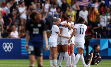 US players celebrate after beating Japan and advancing to the semifinal.