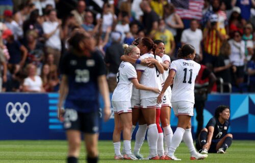 US players celebrate after beating Japan and advancing to the semifinal.