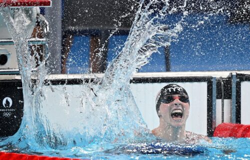 Katie Ledecky celebrates her victory in the women's 1500m swimming final at the 2024 Paris Olympic Games.