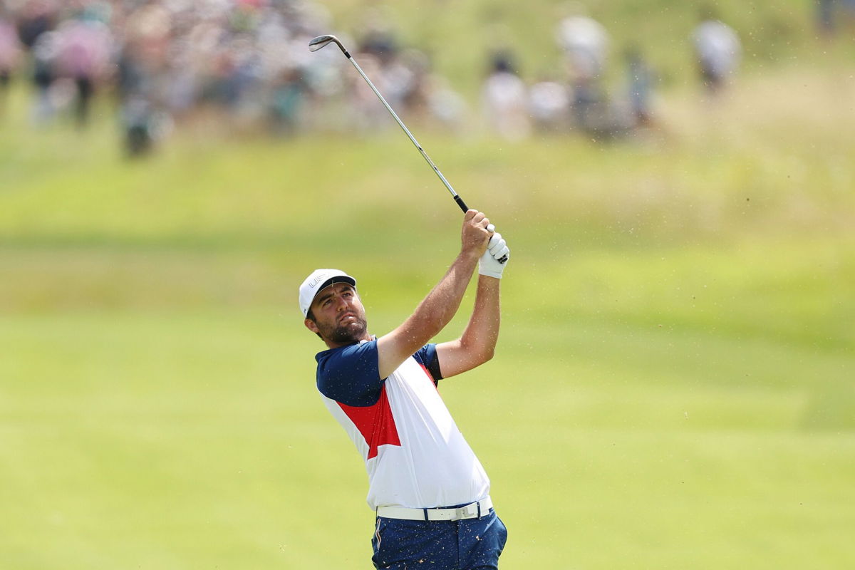 <i>Kevin C. Cox/Getty Images via CNN Newsource</i><br/>Scheffler plays a shot on the sixth hole.