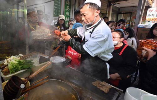 A staff member cooks Tianshui Spicy Hot Pot on March 14