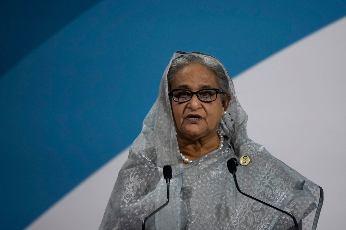 <i>Christophe Ena/AP via CNN Newsource</i><br/>Crowds of protesters on Monday stormed the official residence of Bangladesh's Prime Minister Sheikh Hasina