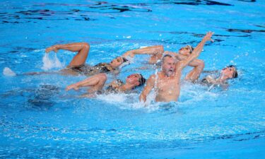 US swimmer Bill May (front) had hoped to become the first man to compete in artistic swimming at the Olympics