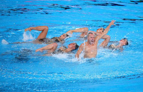 US swimmer Bill May (front) had hoped to become the first man to compete in artistic swimming at the Olympics