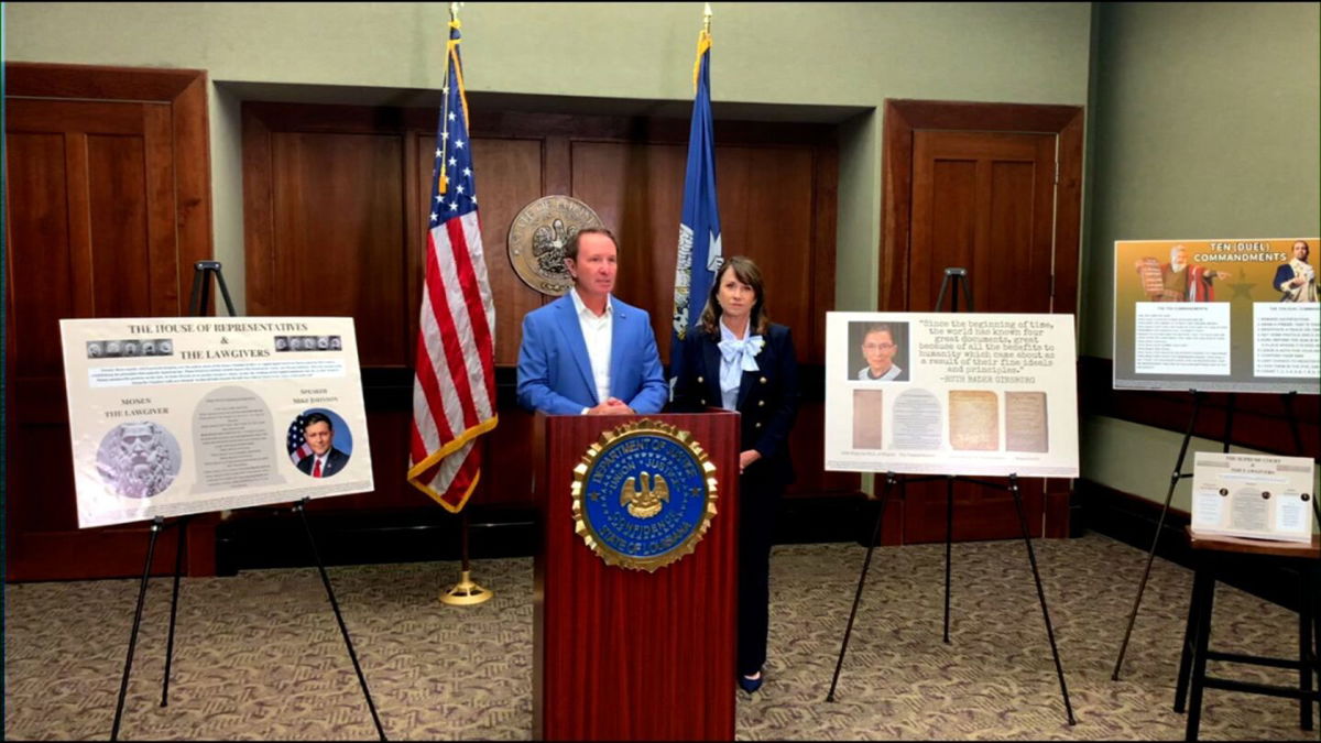 <i>Baton Rouge PD via CNN Newsource</i><br/>Louisiana Gov. Jeff Landry and Attorney General Liz Murrill presented several posters of the Ten Commandments that could soon be placed in the state’s public school classrooms.