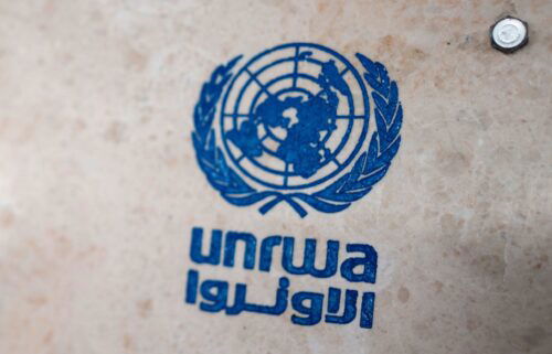 UNRWA's lettering on a sign at the girls' school in the Talibeh refugee camp.