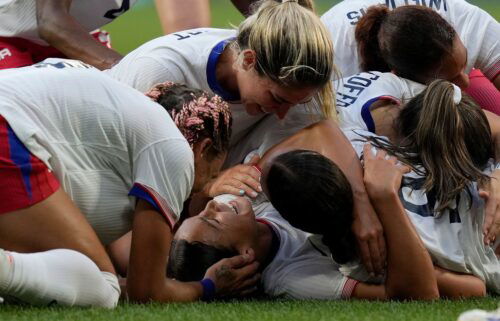 United States' Sophia Smith celebrates with team mates the opening goal during a women's semifinal soccer match between the United States and Germany.