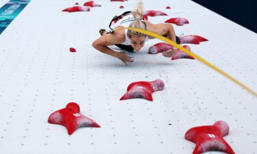 Aleksandra Mirosław was stood poised at the base of a 15-meter climbing wall