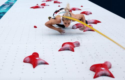 Aleksandra Mirosław was stood poised at the base of a 15-meter climbing wall