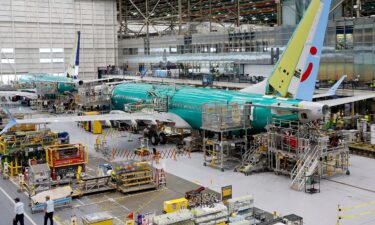 A Boeing 737 MAX aircraft is shown on the assembly line at the Boeing facility in Renton