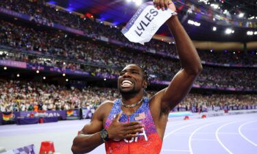 Noah Lyles celebrates winning the gold medal in the men's 100m final on day nine of the 2024 Olympic Games.