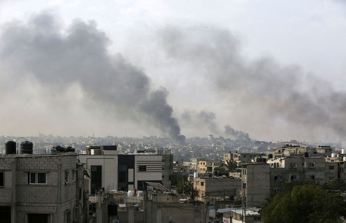 <i>Hatem Khaled/Reuters via CNN Newsource</i><br/>Smoke rises following Israeli strikes in Rafah