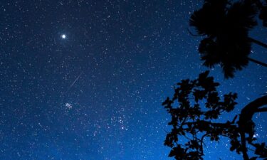 The annual Perseid meteor shower is seen in the night sky on August 14