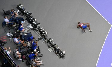 Noah Lyles collapsed after coming in third in the men's 200 meters on August 8.