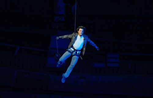 Tom Cruise is lowered on the State de France during the 2024 Summer Olympics closing ceremony on Aug. 11