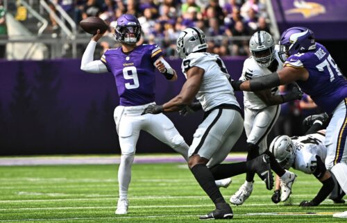 JJ McCarthy throws the ball in the second quarter against the Las Vegas Raiders.