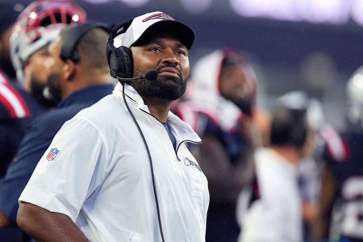 <i>Michael Dwyer/AP via CNN Newsource</i><br/>New England Patriots head coach Jerod Mayo watches a replay during the first half of the preseason game against the Carolina Panthers.