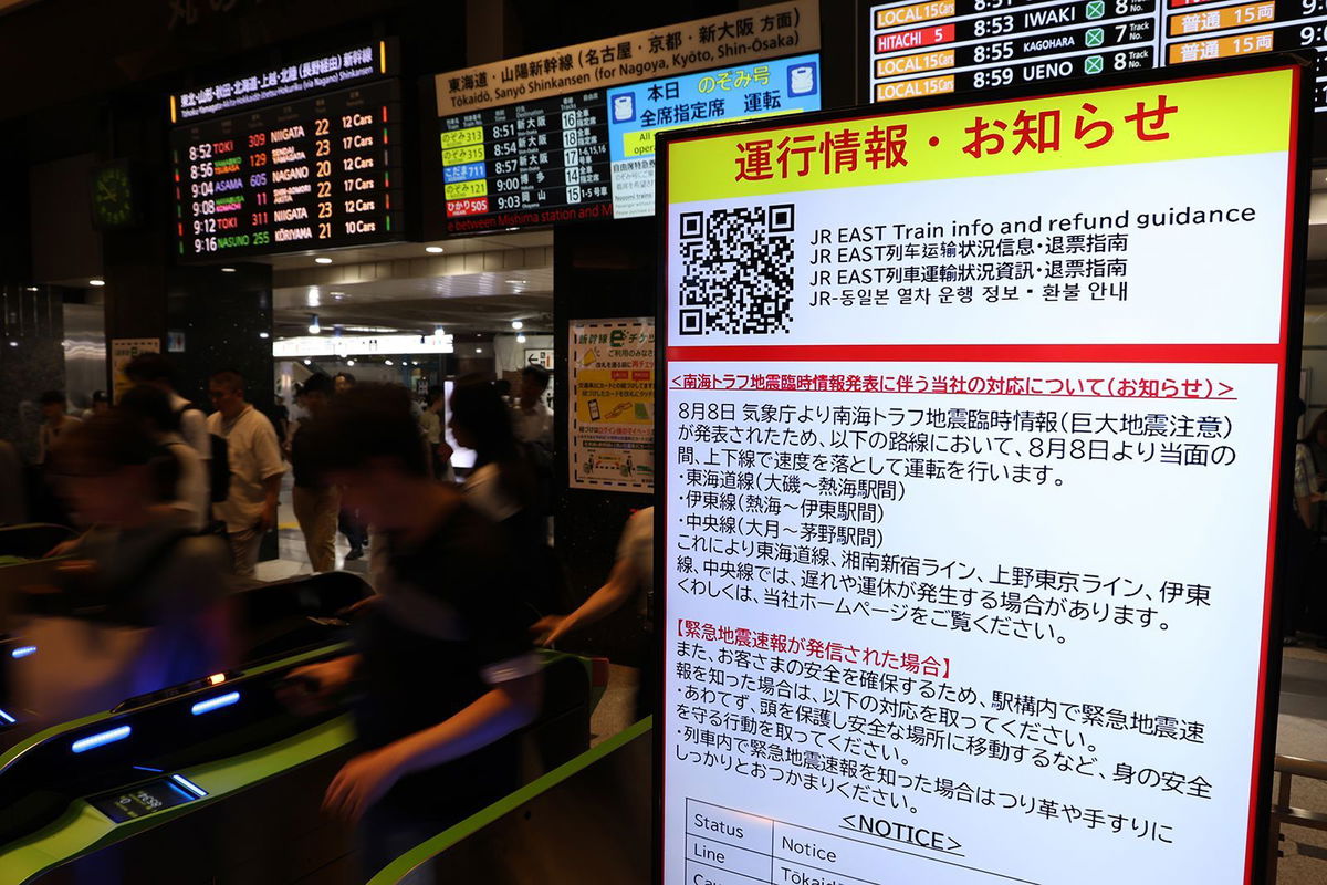 <i>The Asahi Shimbun/Getty Images via CNN Newsource</i><br/>A notice at a railway station announces that trains would operate at reduced speeds after an earthquake advisory on August 9