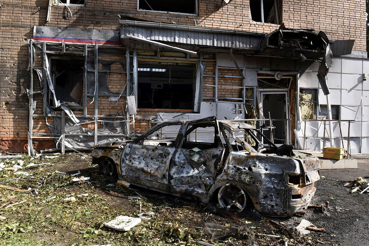 <i>AP via CNN Newsource</i><br/>A burned car is seen in front of an apartment building damaged after shelling by the Ukrainian side in Kursk