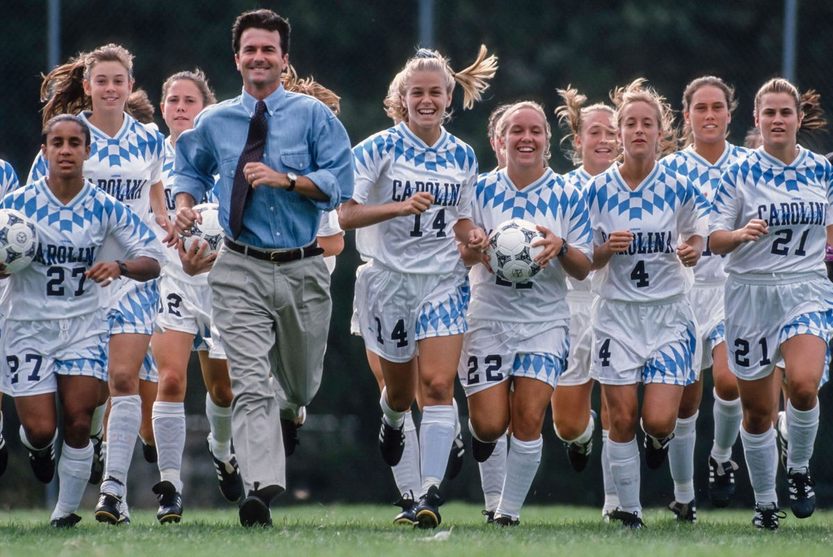 <i>David Madison/Getty Images via CNN Newsource</i><br/>Dorrance runs with the team while training on September 24