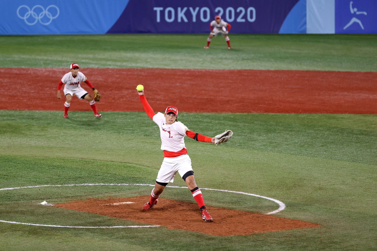 <i>Koji Watanabe/Getty Images via CNN Newsource</i><br/>Yukiko Ueno pitches in the softball gold medal game between Japan and the United States during the Tokyo 2020 Olympics.