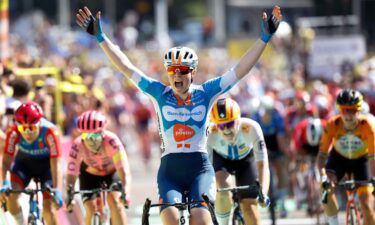 Charlotte Kool celebrates during stage 1 of the Tour de France Femmes in The Hague