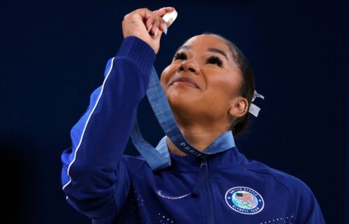 American gymnast Jordan Chiles looks at her bronze medal after the floor event on August 5.