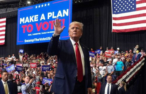 Former President Donald Trump gestures after speaking at a campaign rally in Bozeman