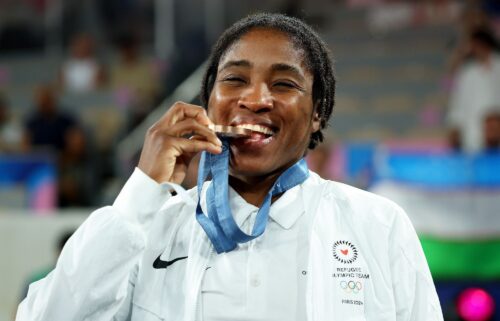 Boxer Cindy Ngamba celebrates her bronze medal at the Paris Olympics.